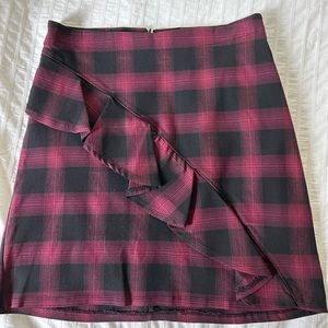 Maroon and black plaid pencil skirt with ruffle across the front.